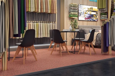 Home textiles are presented on an elegant exhibition stand. The colour-coordinated floor covering consists of joint-friendly exhibition floor click tiles made of bonded rubber granulate.