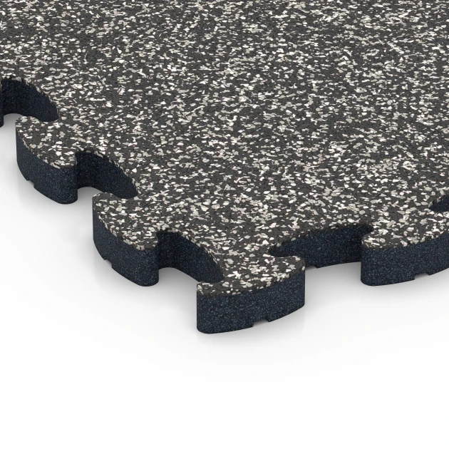 Detailaufnahme der Randausprägung von WARCO-Produkt 6877, Suelo Fitness Max, Format 44,6 x 44,6 × 2,8 cm, Farbe Granito gris oscuro.