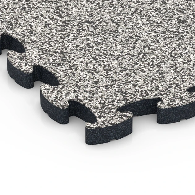 Detailaufnahme der Randausprägung von WARCO-Produkt 6878, Suelo Fitness Max, Format 44,6 x 44,6 × 2,8 cm, Farbe Granito gris.