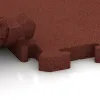 Großaufnahme vom Verbindungssystem von WARCO-Boden 4192 - Pavimento deportivo de caucho HD im Farbdesign Rojo ladrillo. Abmessungen 500 x 500 x 40 mm.