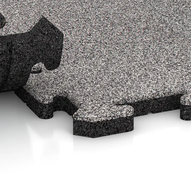 Großaufnahme vom Verbindungssystem von WARCO-Boden 4569 - Playground flooring im Farbdesign Gris jaspeado. Abmessungen 1000 x 1000 x 30 mm.