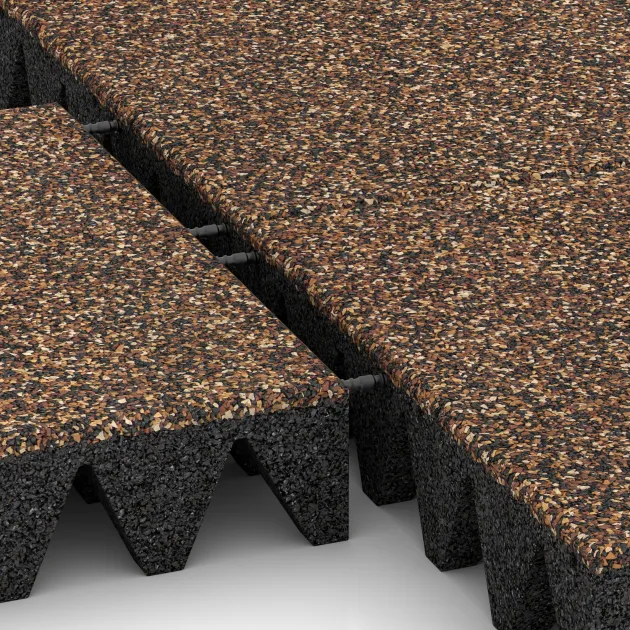 Großaufnahme vom Verbindungssystem von WARCO-Boden 3711 - Loseta de caucho para parques infantiles im Farbdesign Café con leche. Abmessungen 500 x 500 x 100 mm.