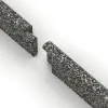 Großaufnahme vom Verbindungssystem von WARCO-Boden 2257 - Rodapié im Farbdesign Granito clásico. Abmessungen 750 x 80 x 20 mm.