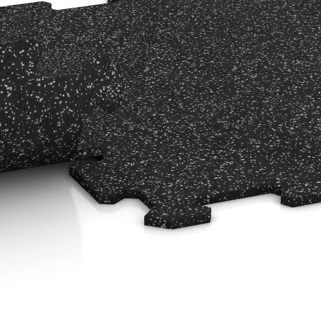 Großaufnahme vom Verbindungssystem von WARCO-Boden 0920 - Suelo de Fitness Compacto im Farbdesign Gris ligeramente moteado. Abmessungen 485 x 485 x 8 mm | 0,235 m².