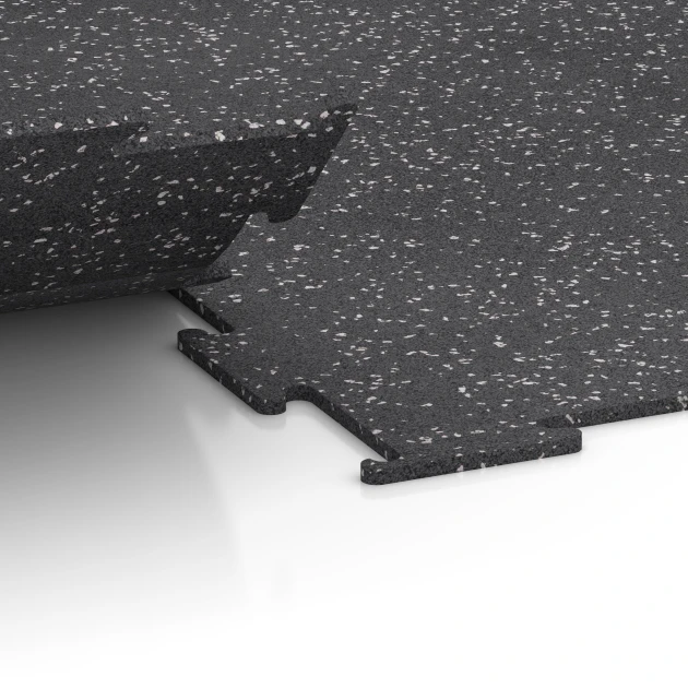 Großaufnahme vom Verbindungssystem von WARCO-Boden 6452 - Suelo de Fitness Compacto im Farbdesign Gris ligeramente moteado. Abmessungen 100 × 100 × 0,8 cm.