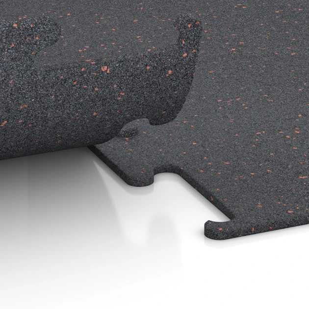 Großaufnahme vom Verbindungssystem von WARCO-Boden 3753 - Fitness Performance Elite Pavimento Deportivo im Farbdesign Rojo ligeramente moteado. Abmessungen 100 x 100 x 1 cm | 1,00 m².