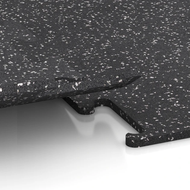 Großaufnahme vom Verbindungssystem von WARCO-Boden 3780 - Pavimento Fitness Performance Elite im Farbdesign Gris ligeramente moteado. Abmessungen 50 x 50 x 1,5 cm | 0,25 m².