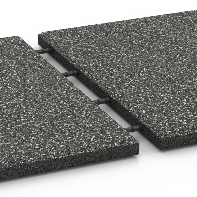 Großaufnahme vom Verbindungssystem von WARCO-Boden 6413 - Loseta amortiguadora – 90 cm im Farbdesign Granito gris oscuro. Abmessungen 50 x 50 x 3 cm | 0,25 m².