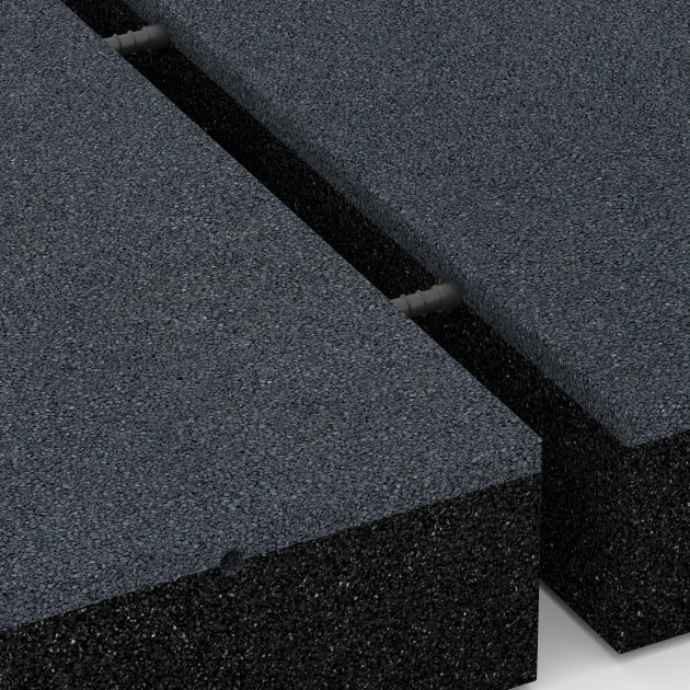 Großaufnahme vom Verbindungssystem von WARCO-Boden 6281 - Baldosa amortiguadora – 300 cm im Farbdesign Gris pizarra. Abmessungen 50 x 50 x 11 cm.