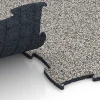 Großaufnahme vom Verbindungssystem von WARCO-Boden 6806 - Pavimento agility canino im Farbdesign Granito gris. Abmessungen 97,1 x 97,1 × 1,8 cm.