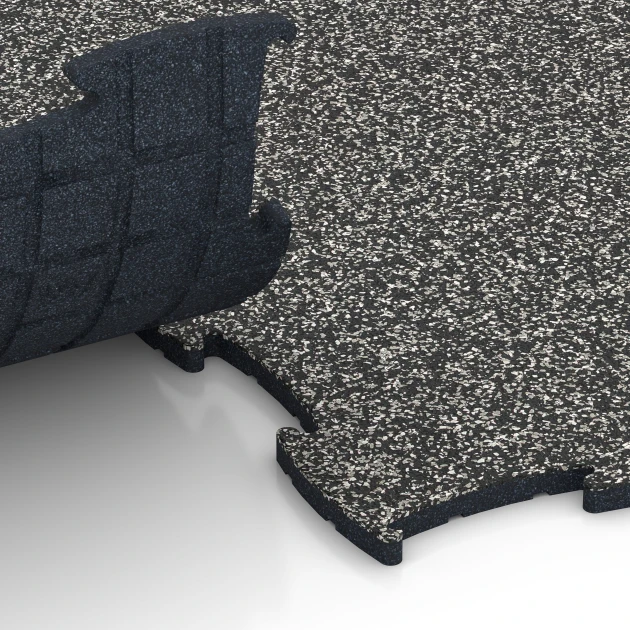Großaufnahme vom Verbindungssystem von WARCO-Boden 6868 - Suelo Fitness Max im Farbdesign Granito gris oscuro. Abmessungen 97,1 x 97,1 × 1,8 cm.