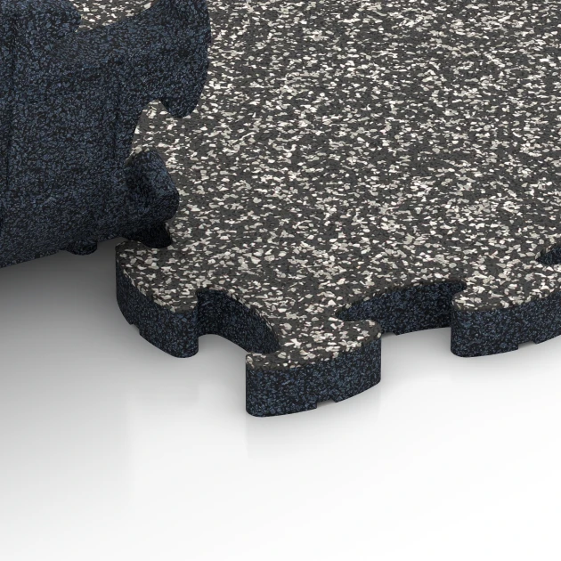 Großaufnahme vom Verbindungssystem von WARCO-Boden 6940 - Loseta de terraza im Farbdesign Granito gris oscuro. Abmessungen 44,6 x 44,6 × 2,8 cm.