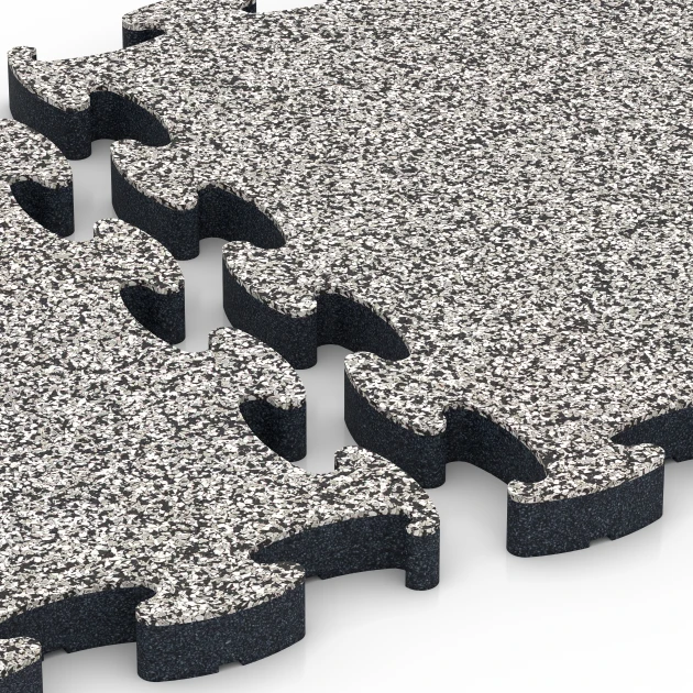 Großaufnahme vom Verbindungssystem von WARCO-Boden 6878 - Suelo Fitness Max im Farbdesign Granito gris. Abmessungen 44,6 x 44,6 × 2,8 cm.
