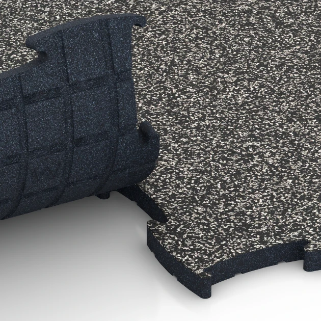 Großaufnahme vom Verbindungssystem von WARCO-Boden 6886 - Suelo Fitness Max im Farbdesign Granito gris oscuro. Abmessungen 97,1 x 97,1 x 2,8 cm.