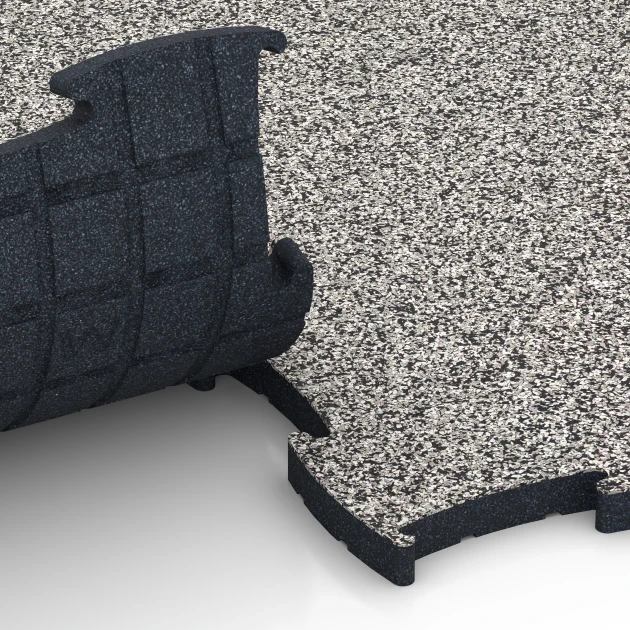 Großaufnahme vom Verbindungssystem von WARCO-Boden 6887 - Suelo Fitness Max im Farbdesign Granito gris. Abmessungen 97,1 x 97,1 x 2,8 cm.